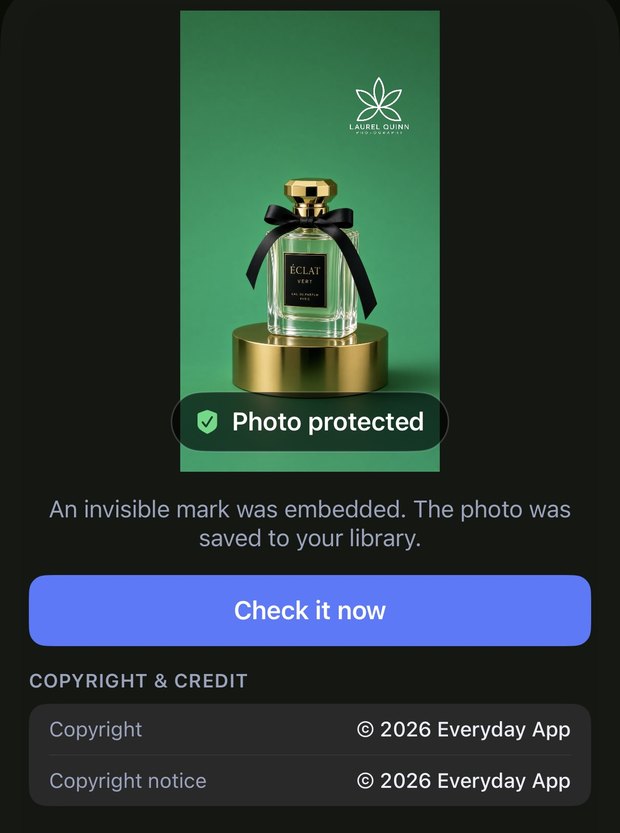 The app confirming a photo has been protected with an invisible mark and copyright details