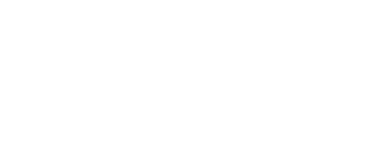 A handwritten signature being drawn onto a photo